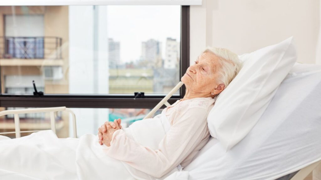 Senior Woman Is Sick in hospital bed