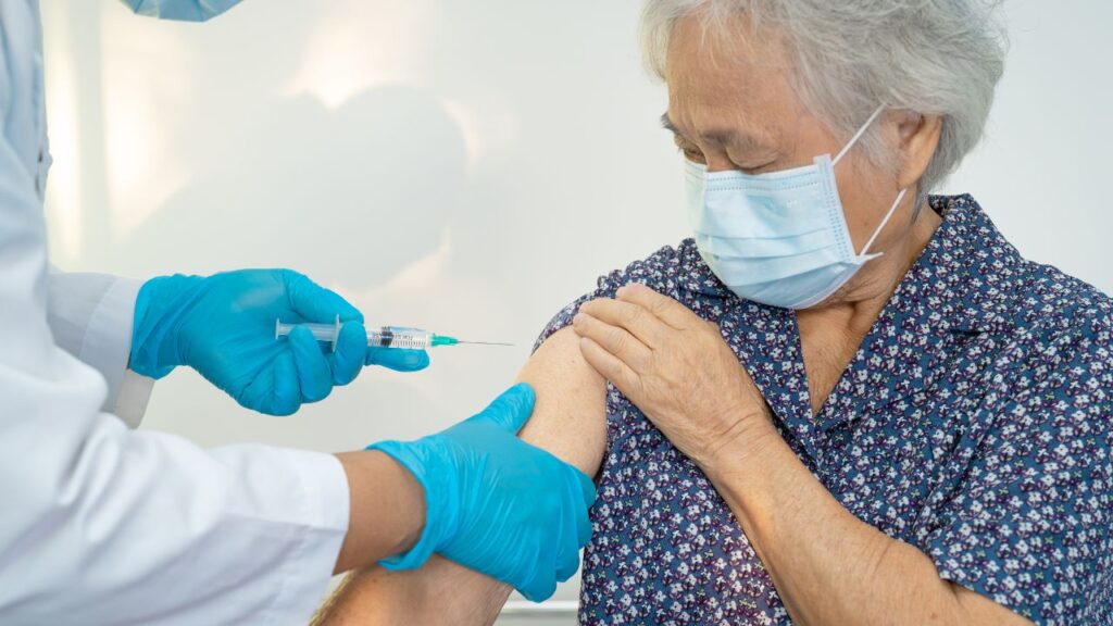 Senior woman getting covid-19 vaccine