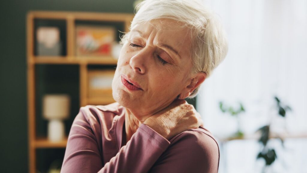 Senior woman with neck pain