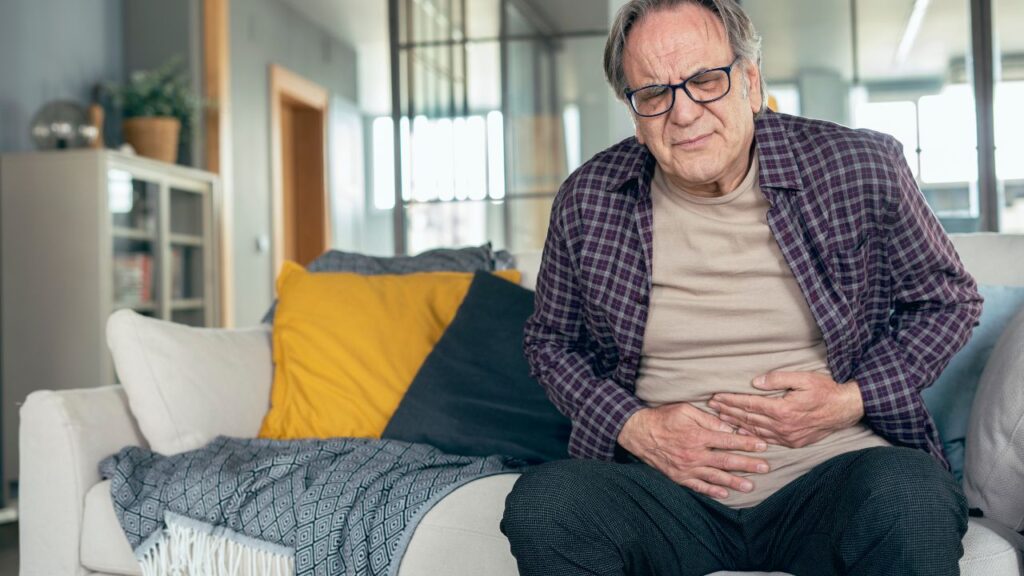 Senior man with stomach pain